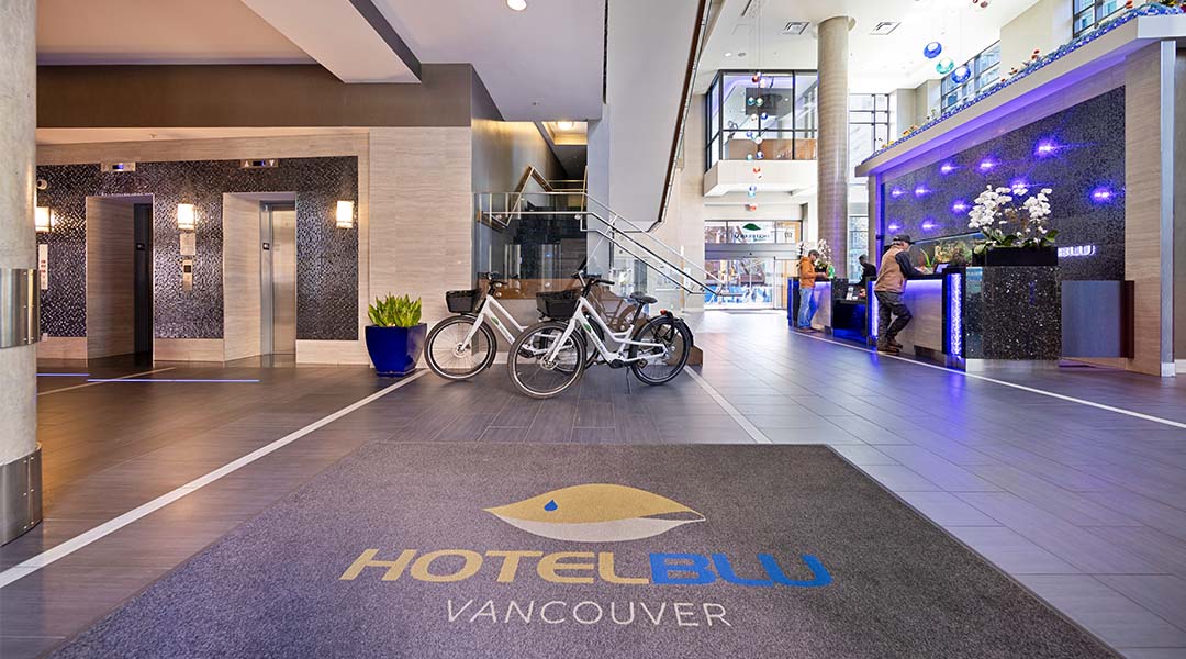 Two electric bikes in the lobby at Hotel BLU in Vancouver, BC