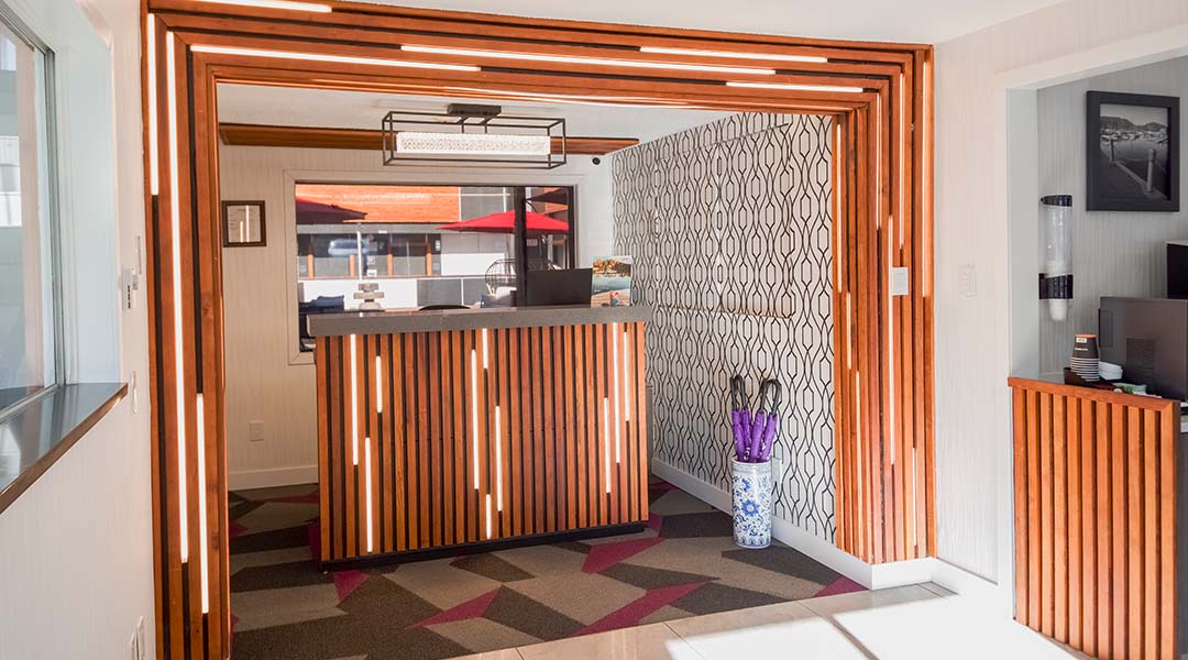 Lobby of Coast Metro Vancouver with a check-in desk