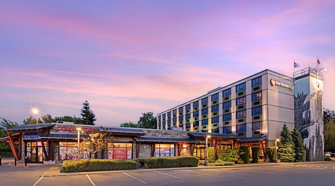 Exterior of the Best Western Plus Barclay Hotel at sunset
