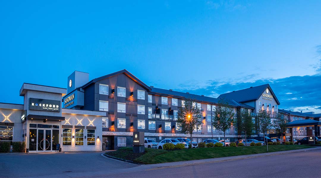 Exterior of the Sandman Signature hotel in Prince George at night