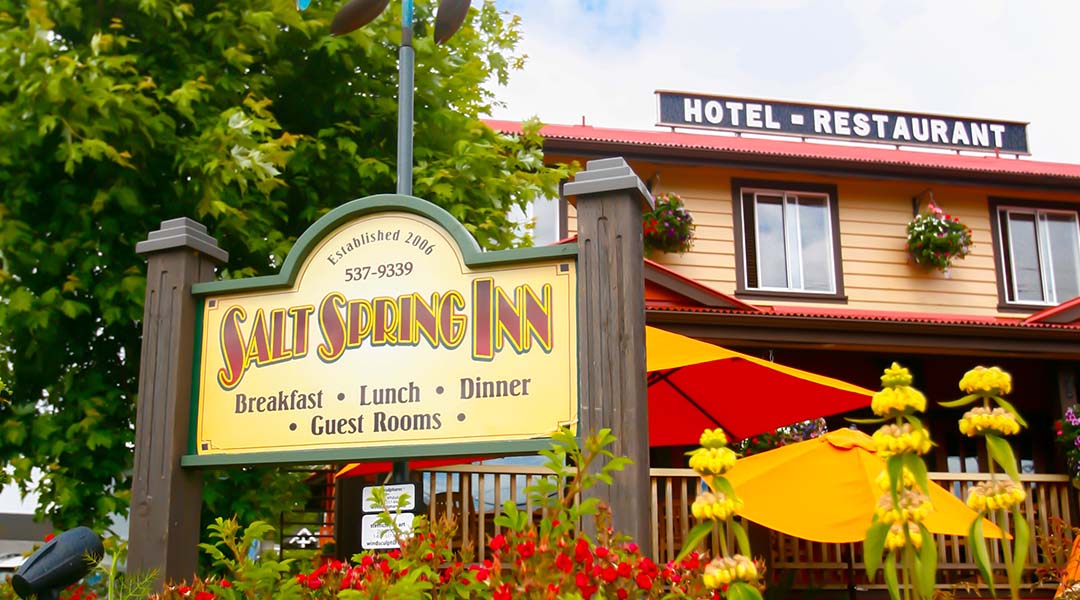 Exterior view of the Salt Spring Inn including sign
