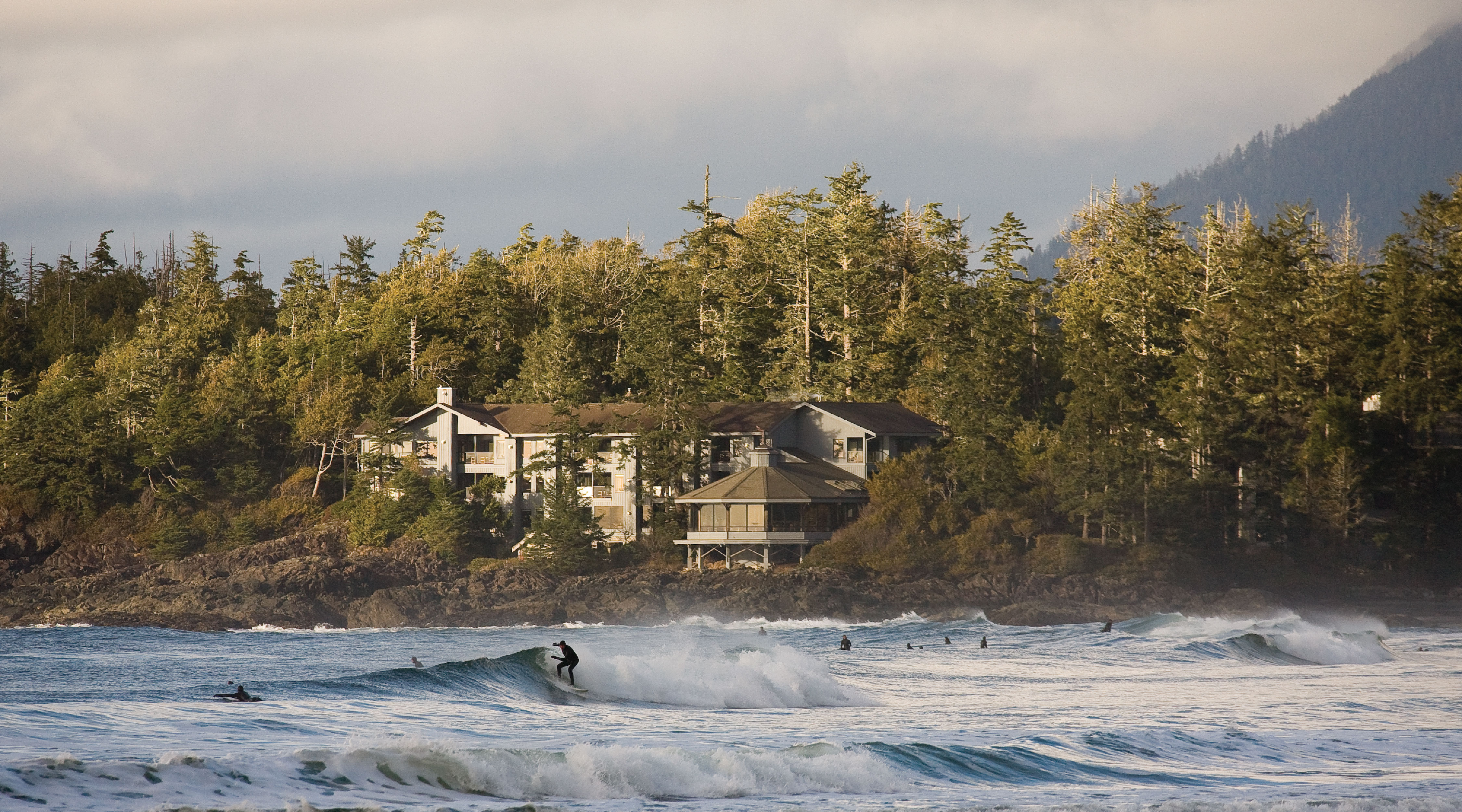 Exterior shot with surfers