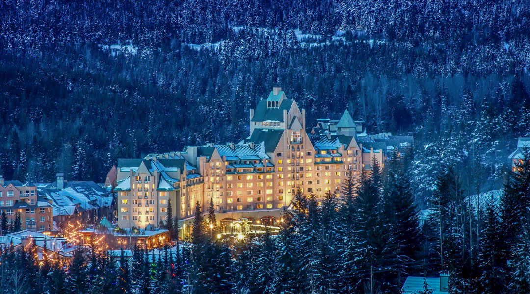 Exterior image of Fairmont Chateau Whistler in winter 