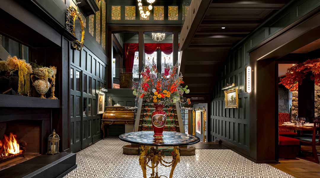 Interior the the Rosemead House with antique vase in hallway 