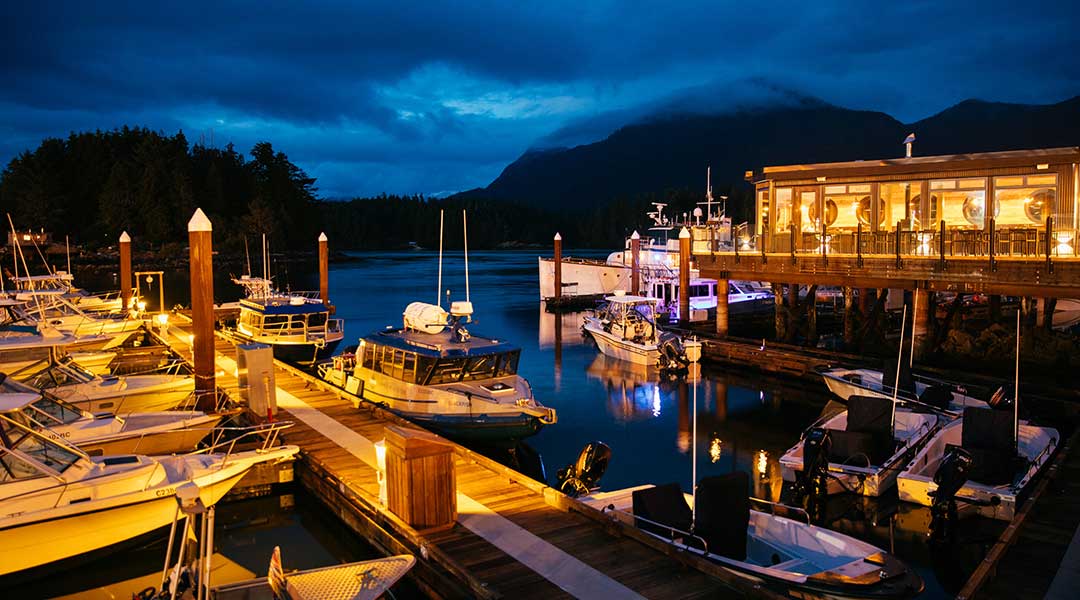Marina at night with boats docked at Tofino Resort and Marina on Vancouver Island
