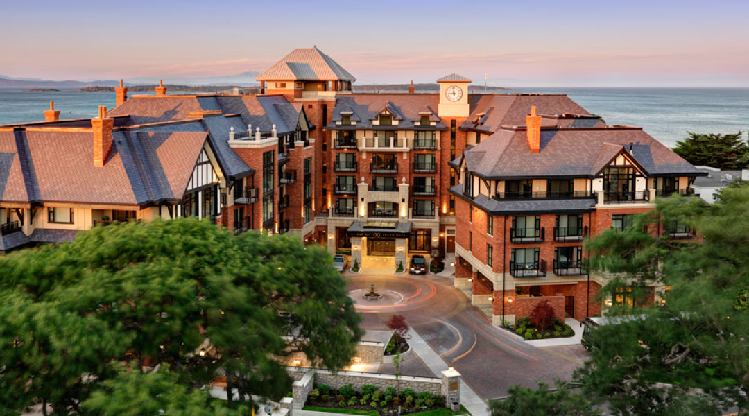 Exterior of Oak Bay Beach Hotel at dusk in Victoria BC
