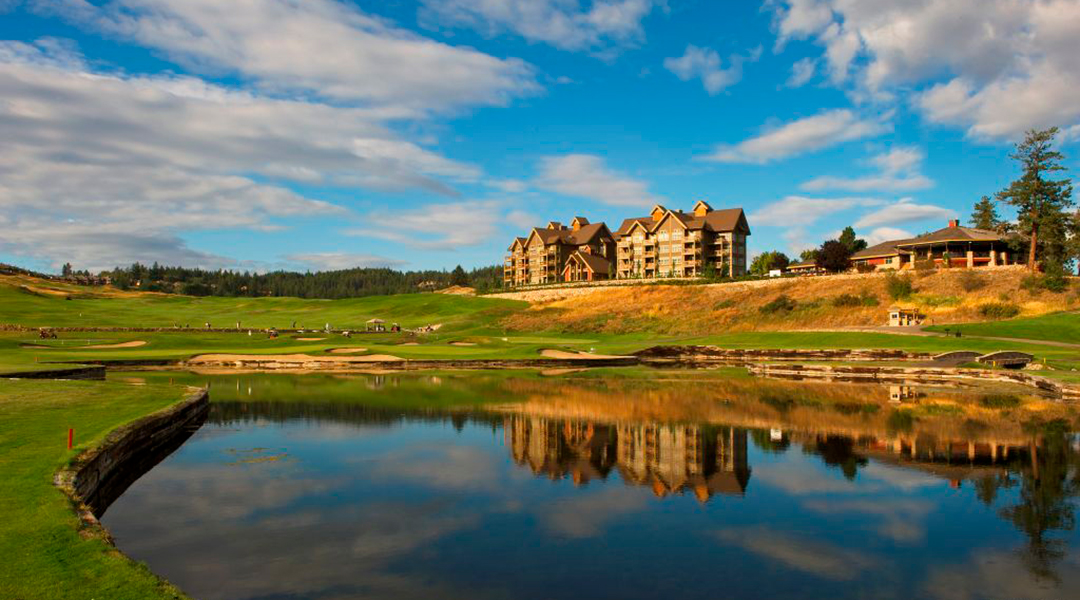 Predator Ridge Resort front lawn and pond at golden hour in Vernon BC