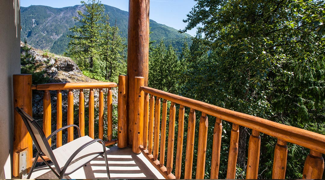 Thebalcony with mountain views in the premium room at the Coast Hillcrest Hotel in Revelstoke