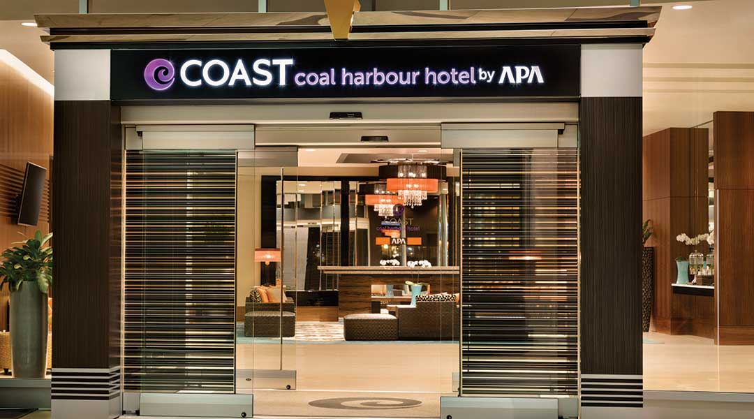The exterior entrance of the Coast Coal Harbour Hotel by APA in Vancouver