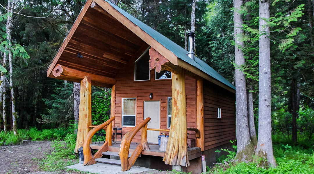 Exterior entrance and balcony of the Chalet Two-Cinnamon Bear at the Bella Coola Grizzly Tours in the Cariboo Chilcotin Coast