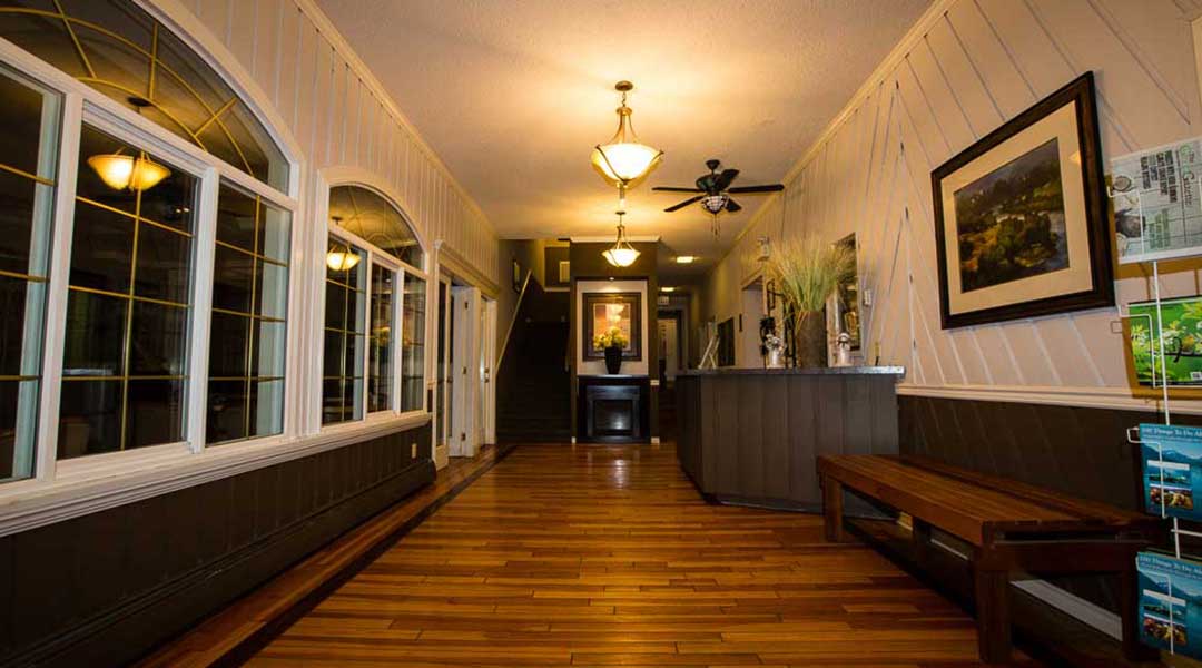 The lobby with seating area at the Bella Coola Valley Inn