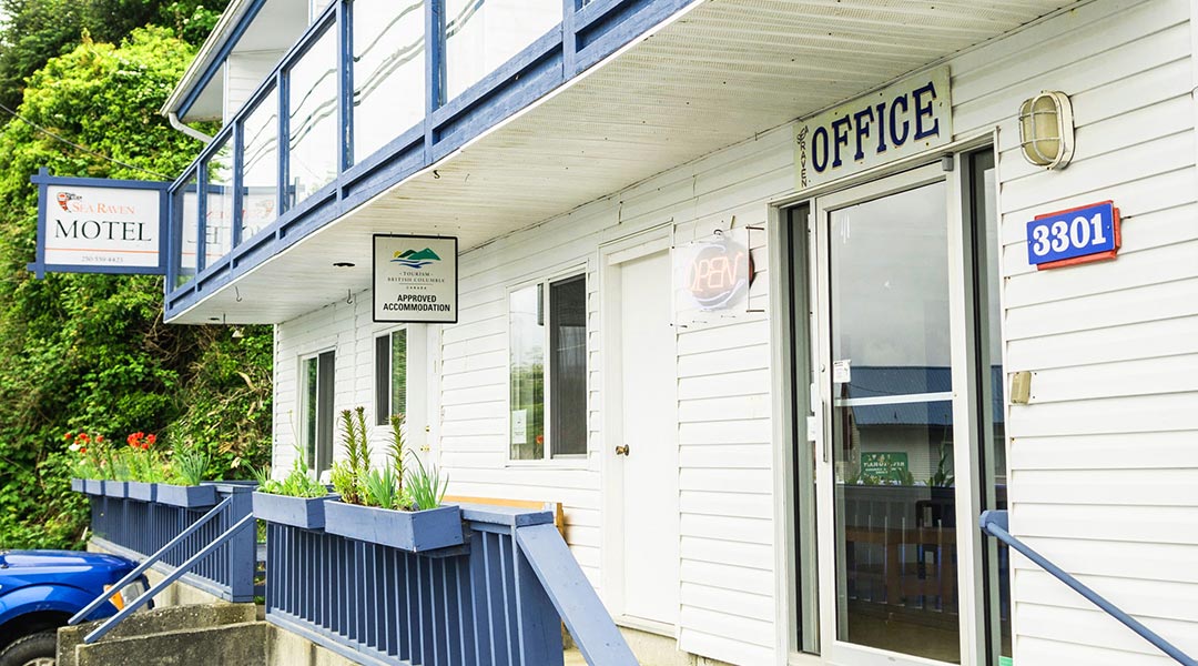 Exterior building and entrance of the Sea Raven Motel in Queen Charlotte Haida Gwaii