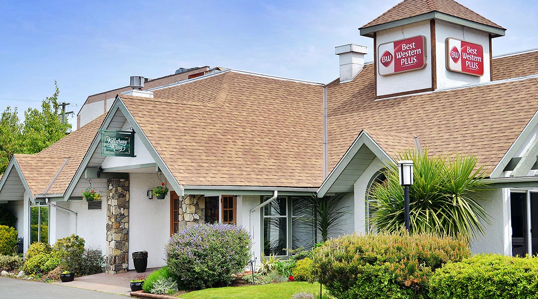 The exterior building of the Killarney wing at the Best Western Plus Emerald Isle Hotel in Sidney