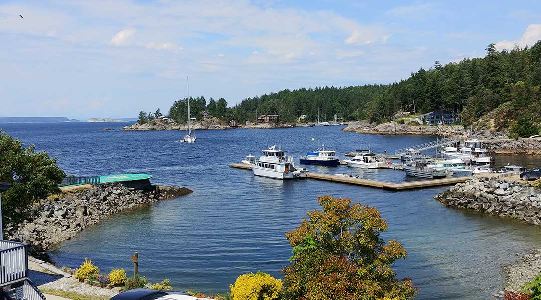 Finn Bay view of dock and ocean at The Lund Resort at Klah Ah Men near Powell River BC on the Sunshine Coast