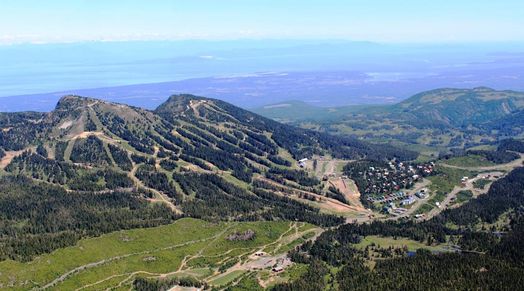 Aerial view of Mount Washington ski hill in the summertime on Vancouver Island