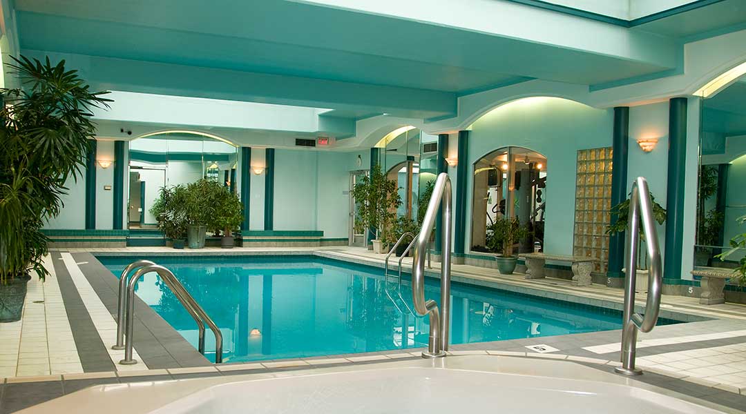 The indoor swimming pool and hot tub at the Chateau Victoria Hotel on Vancouver Island