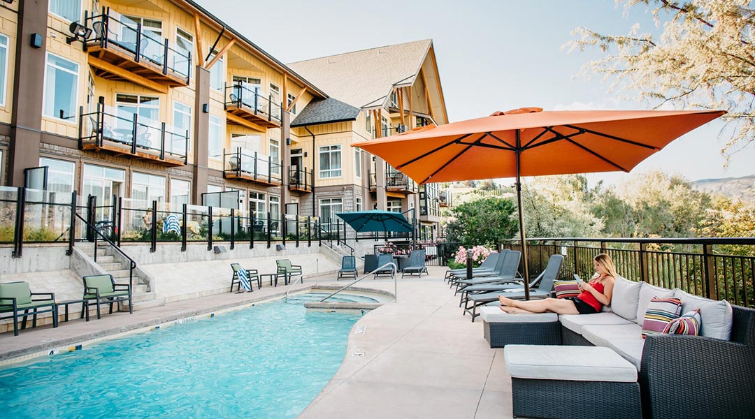 The exterior building and outdoor pool at the Summerland Waterfront Resort in Thompson Okanagan