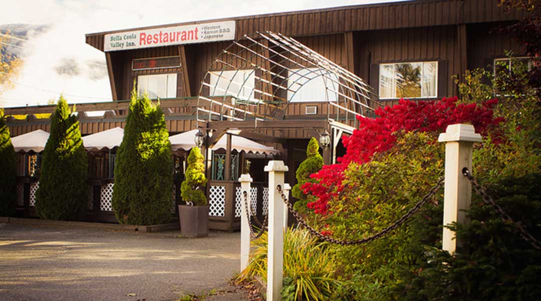 The exterior entrance of the Bella Coola Valley Inn during spring
