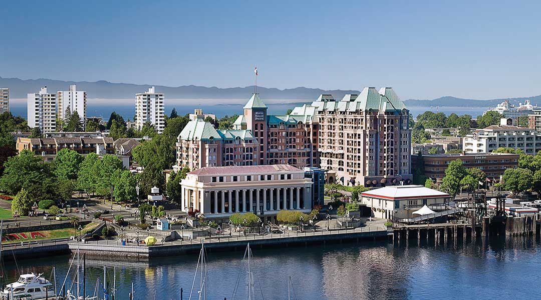 Aerial view of the exterior building of the Hotel Grand Pacific in Victoria BC by the harbour