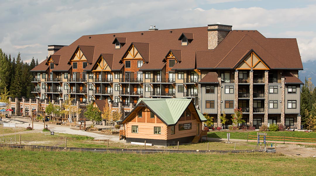 The exterior building of the Glacier Mountaineer Lodge near Kicking Horse Mountain Resort in Golden