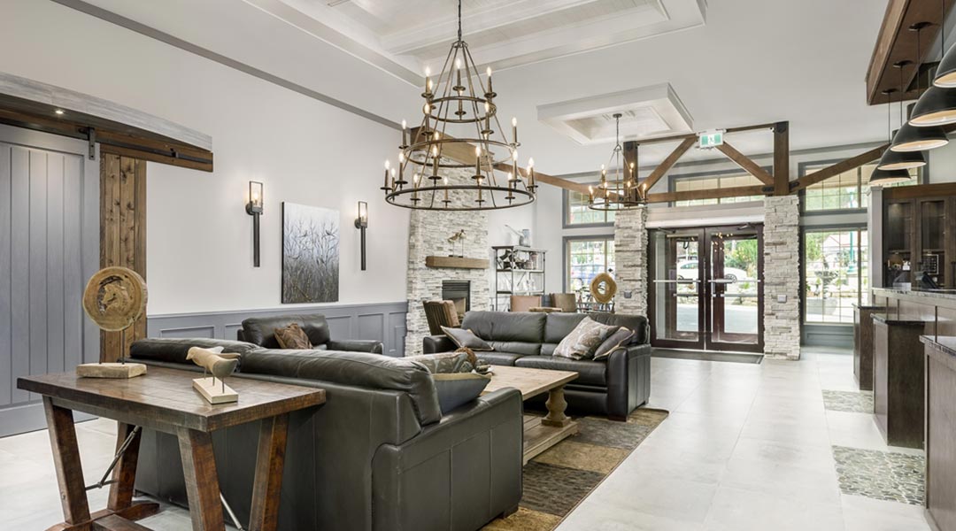 The lobby seating area and front entrance of the Prestige Radium Hot Springs Resort