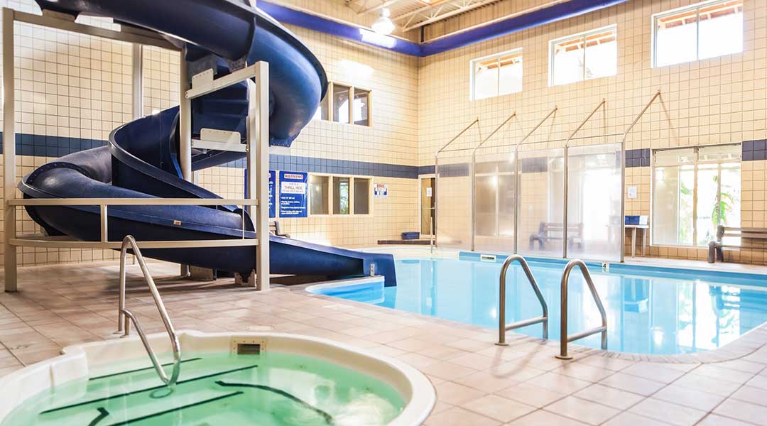The indoor pool and waterslide at the Coast Osoyoos Beach Hotel in Thompson Okanagan
