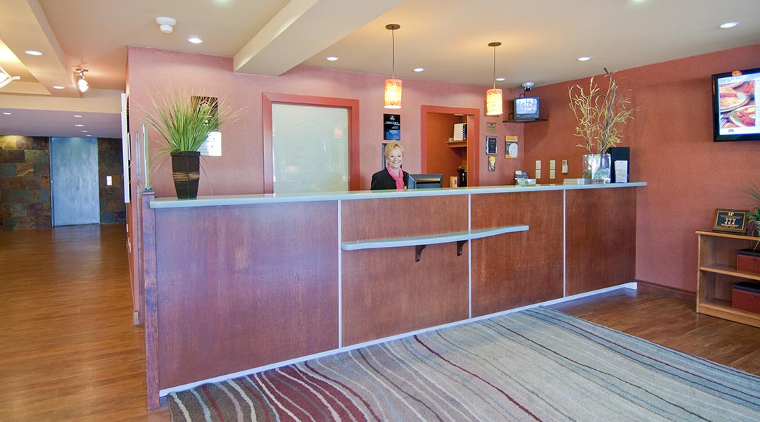 The front lobby desk at the Best Western Plus Emerald Isle Hotel in Sidney