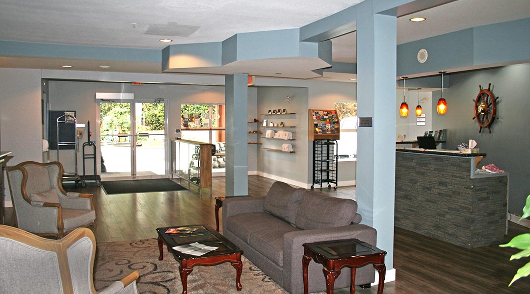 The interior lobby and seating area of the Quarterdeck Resort and Marina in Port Hardy