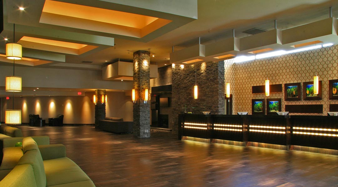 The front desk in the lobby area at the Sandman Signature Vancouver Airport Hotel and Resort in Richmond