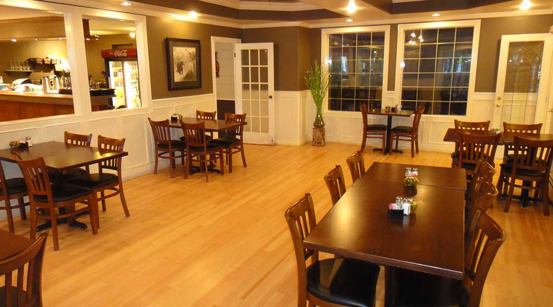 The dining tables inside the restaurant at the bella Coola Valley Inn